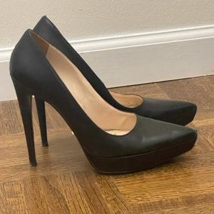 Genuine Prada black leather pumps/heels - Approx. 5inch.